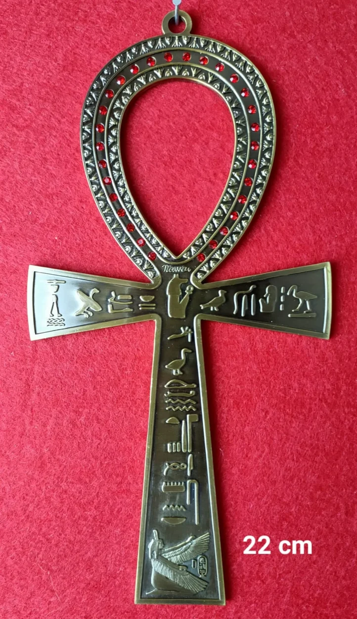 A Ankh, símbolo de poder e sabedoria cósmica, como ferramenta de transformação espiritual e conexão com dimensões superiores.